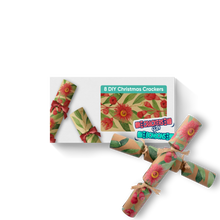 Load image into Gallery viewer, Image of two Christmas crackers next to some packaging
